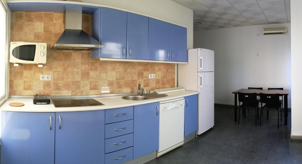 Kuchyň nebo kuchyňský kout v ubytování Hostal Jentoft