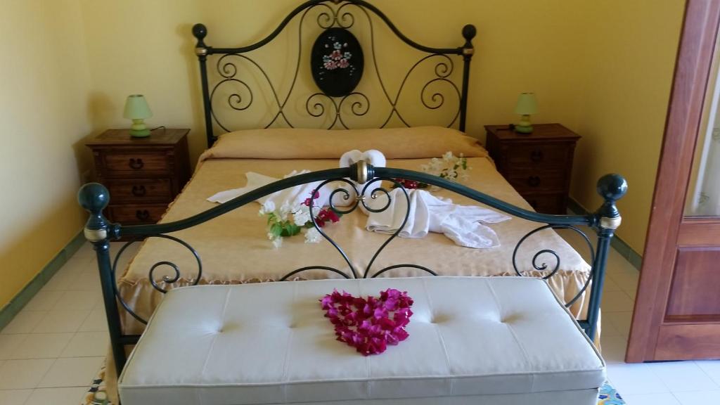 A bed or beds in a room at B&B Villa Maristella