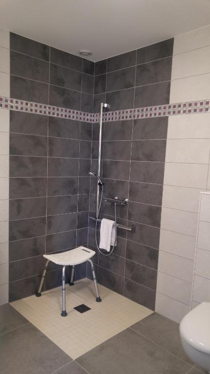 Koupelna v ubytování Hôtel Le Verger