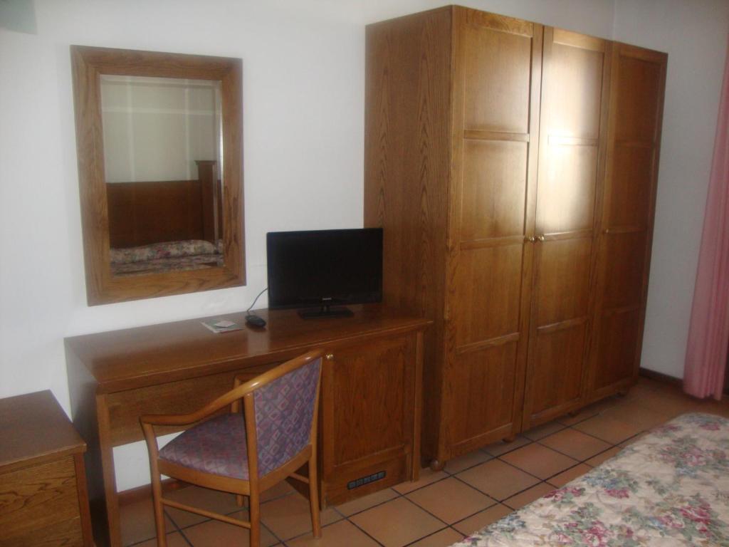 TV a/nebo společenská místnost v ubytování Hotel Cristal
