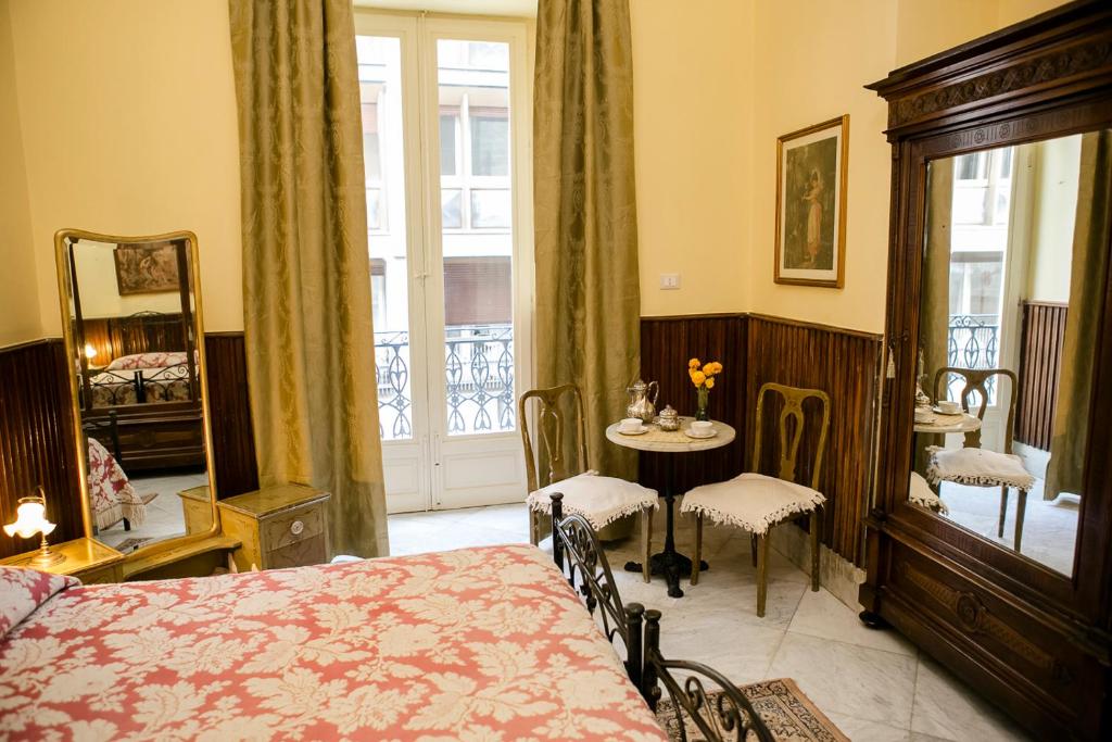 A bed or beds in a room at B&B Santa Caterina