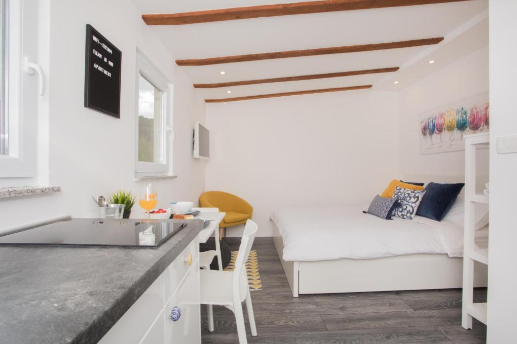 Posteľ alebo postele v izbe v ubytovaní Studio Apartment Škatula