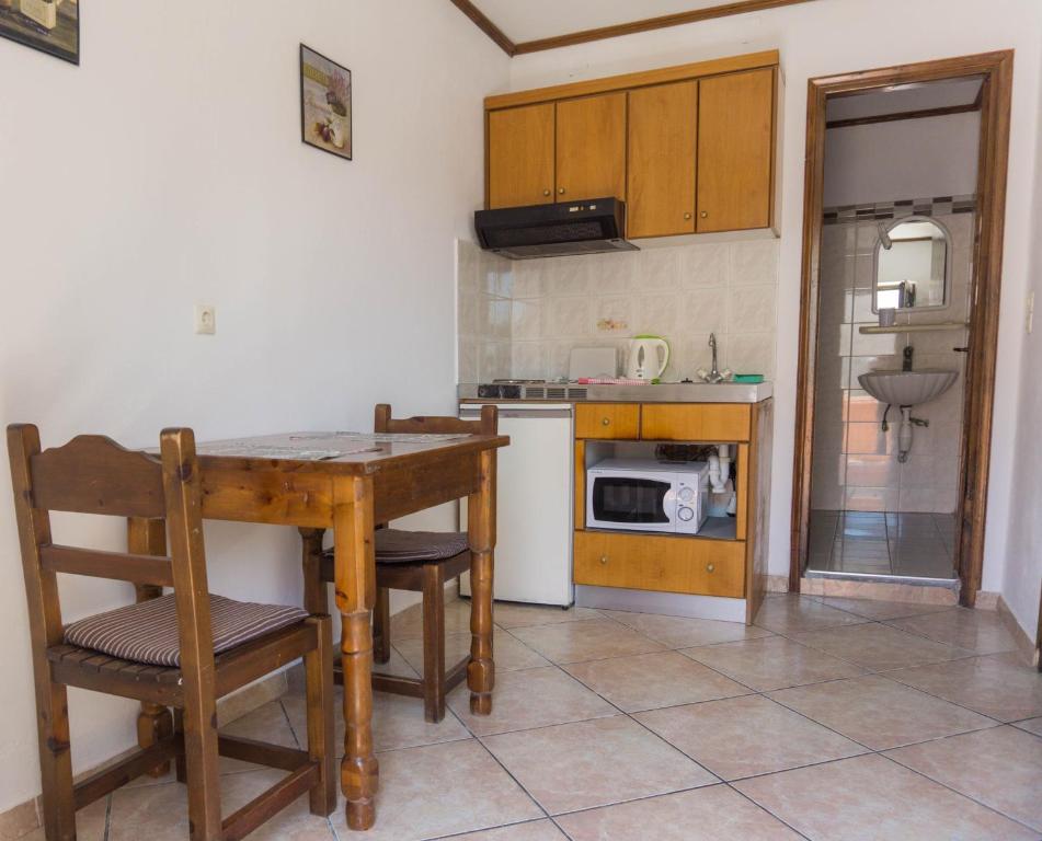 Kuchyň nebo kuchyňský kout v ubytování Venus Apartments