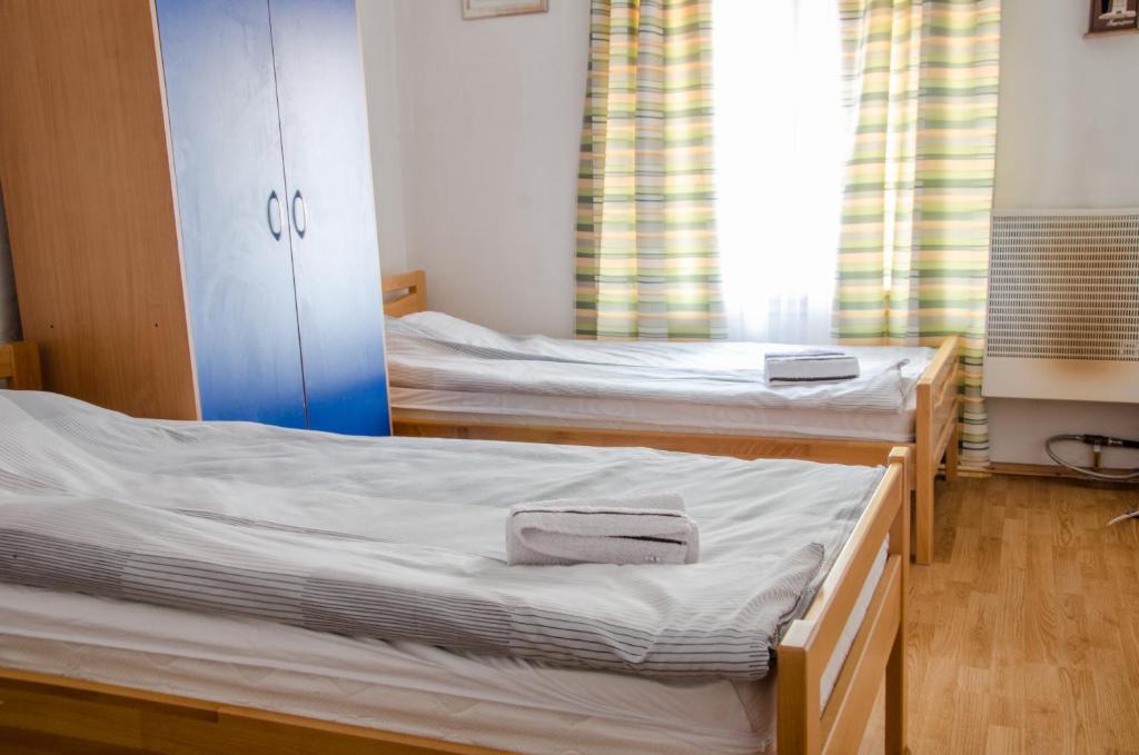Postel nebo postele na pokoji v ubytování Guesthouse Unique