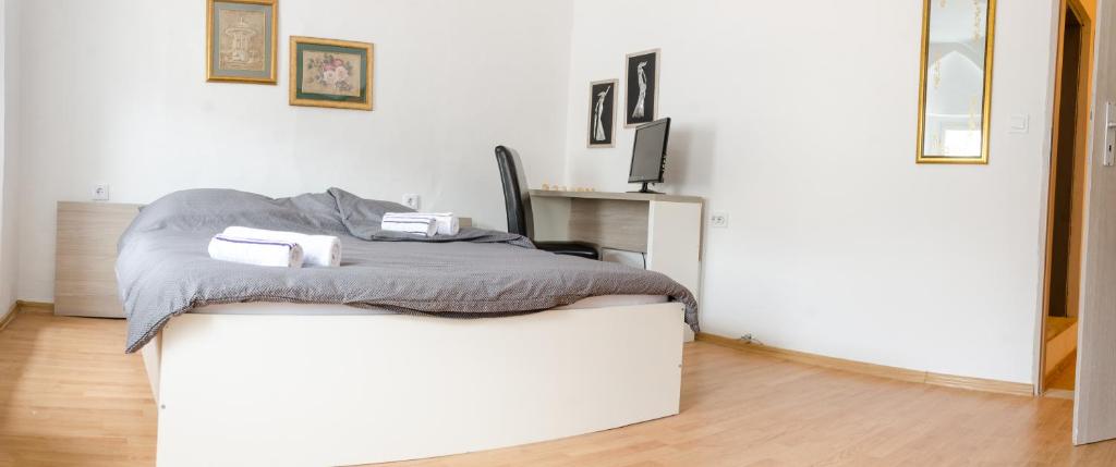 Postel nebo postele na pokoji v ubytování Guesthouse Unique