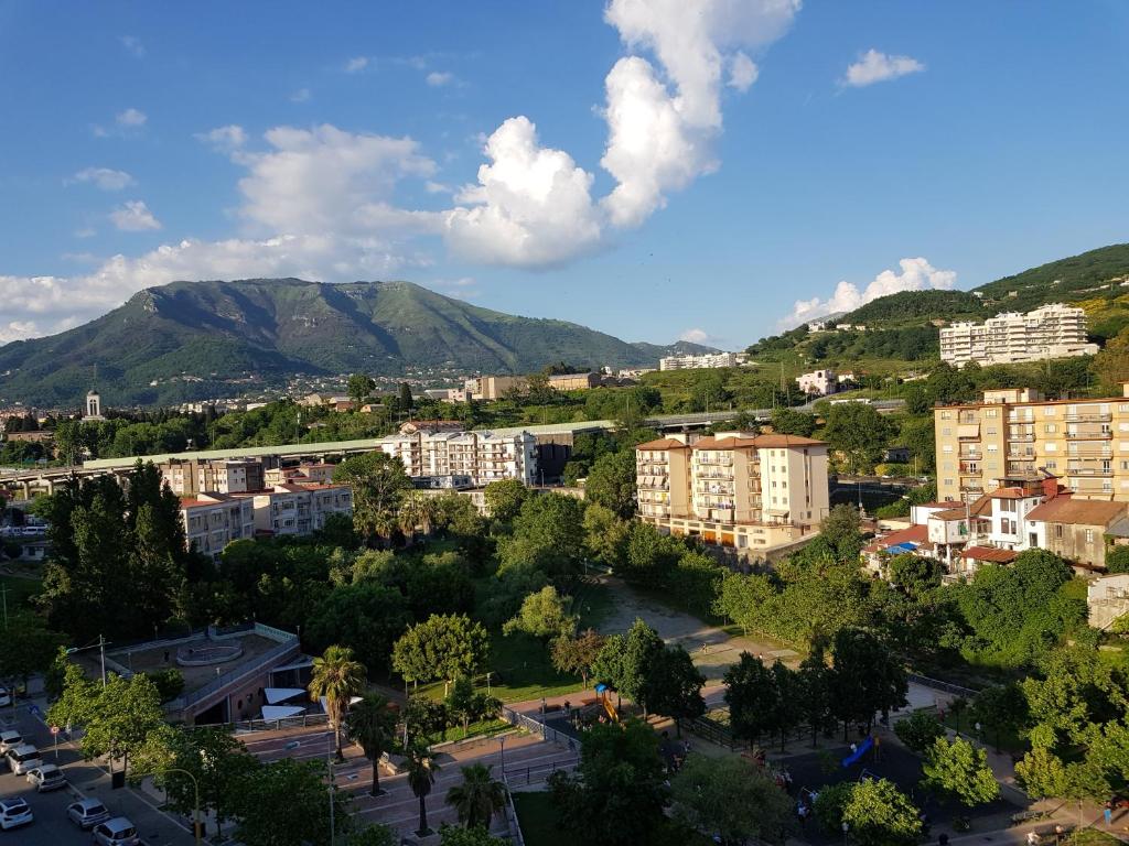 an aerial view of a city with mountains in the background at Apartment in Salerno Parco in Salerno