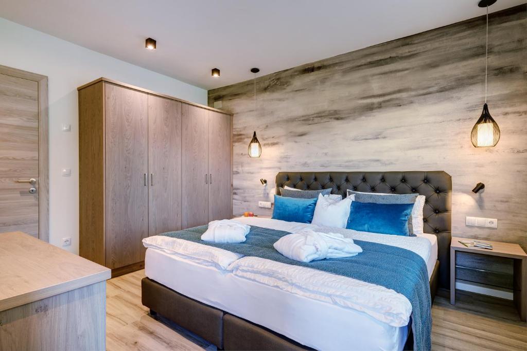 Łóżko lub łóżka w pokoju w obiekcie Apartments Lichtenberg