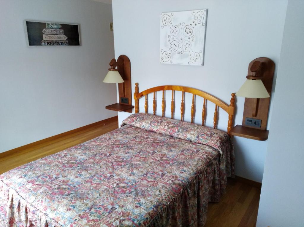 Postel nebo postele na pokoji v ubytování Hotel Las Nieves