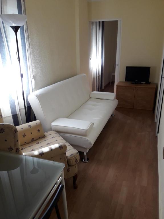 Televízia a/alebo spoločenská miestnosť v ubytovaní APARTAMENTOS VIALIA SOL y PLAYA