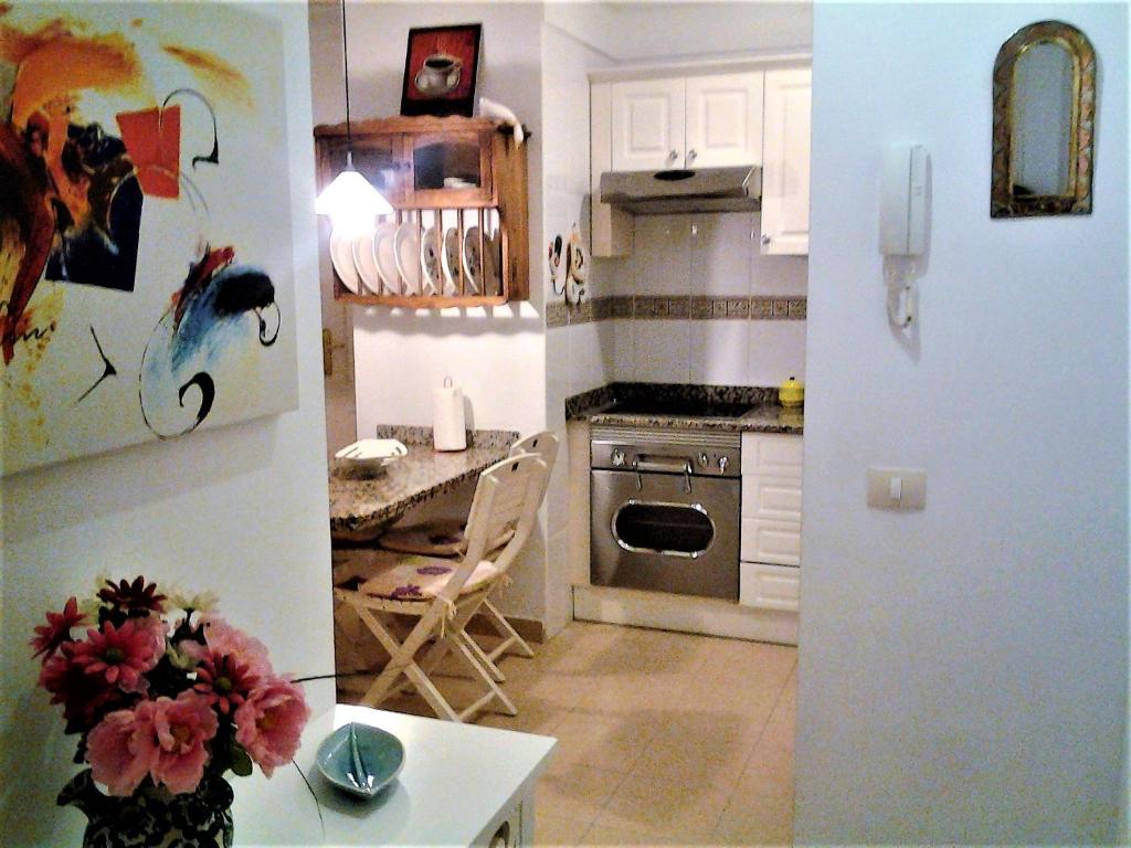 Kuchyň nebo kuchyňský kout v ubytování Holiday home Los Frailes