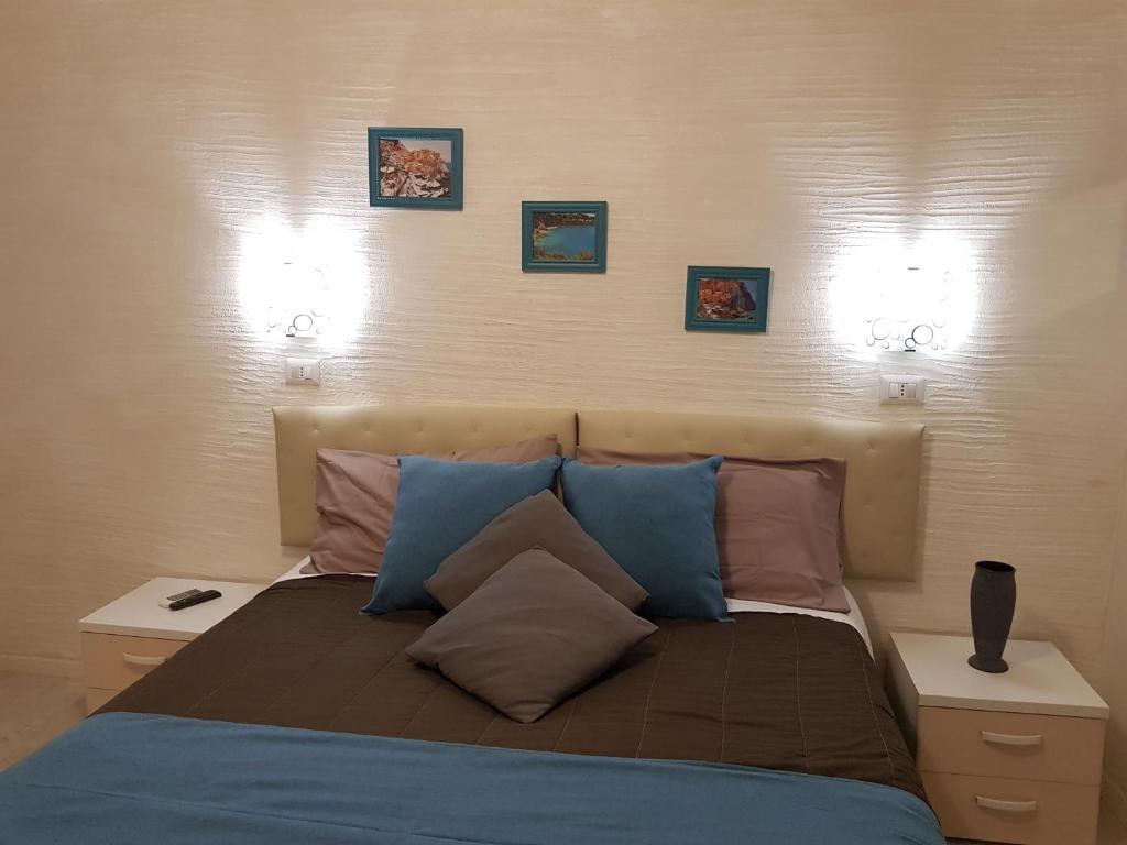 Postel nebo postele na pokoji v ubytování Il Quadrifoglio guesthouse