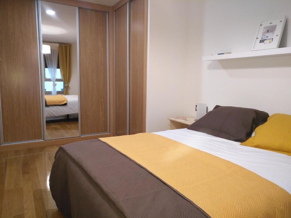 Postel nebo postele na pokoji v ubytování Apartamento Playa Poniente