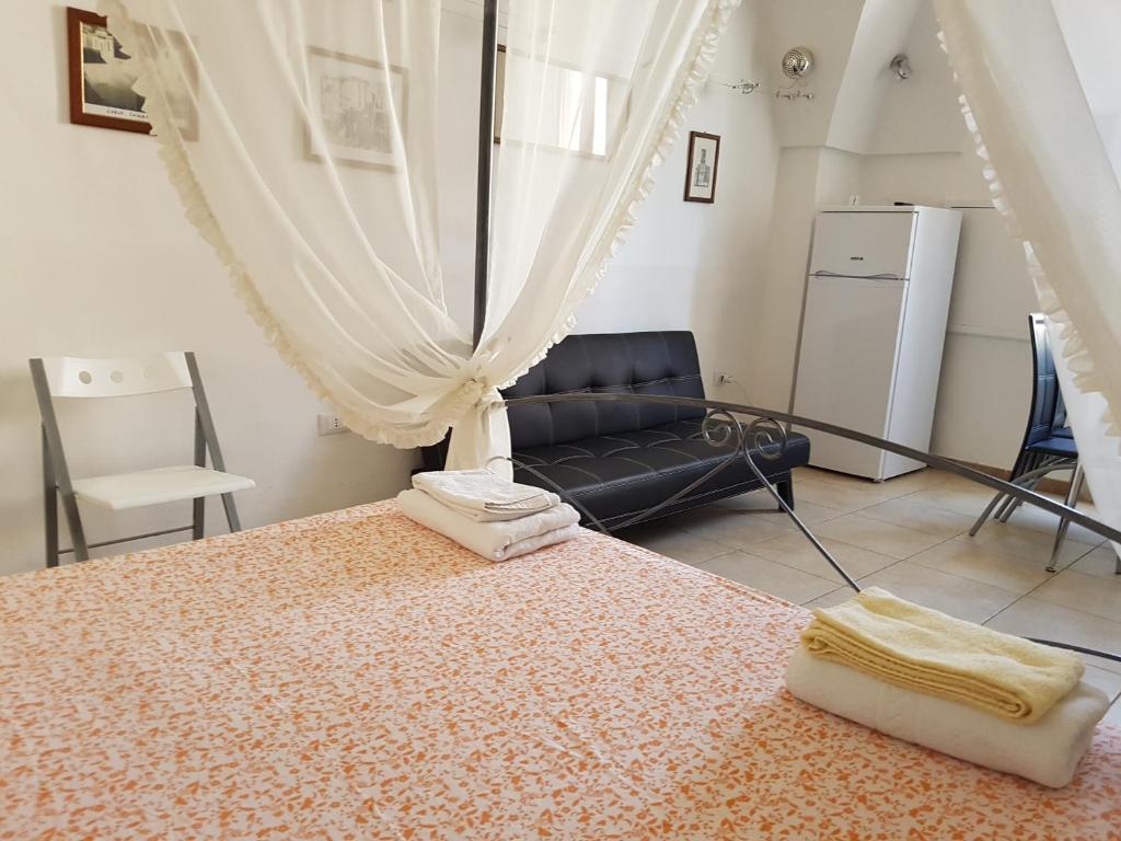 Llit o llits en una habitació de Calì Nitta Storic