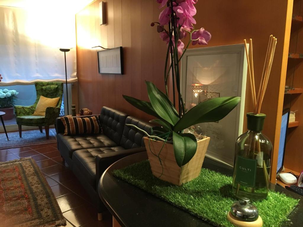 TV a/nebo společenská místnost v ubytování Hotel Le Palme " Adults only "