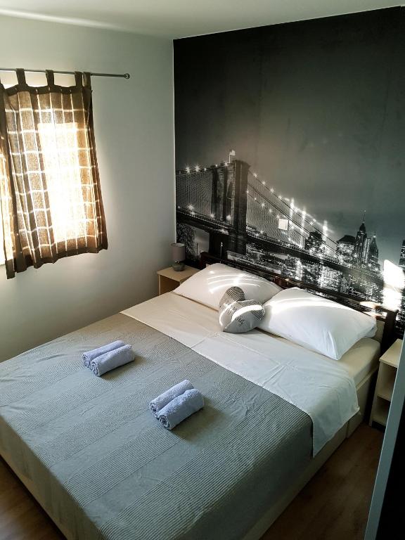 Posteľ alebo postele v izbe v ubytovaní Apartments Kalajica