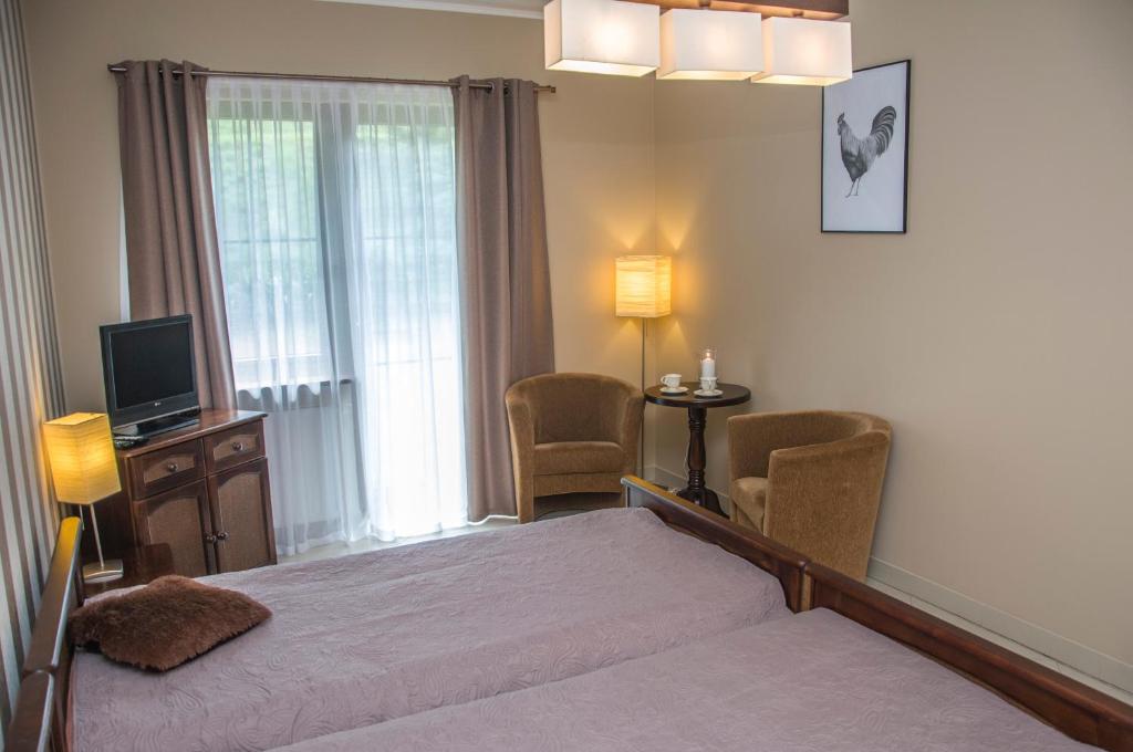 Posteľ alebo postele v izbe v ubytovaní Apartament 6 Cappucino Pod Aniołem