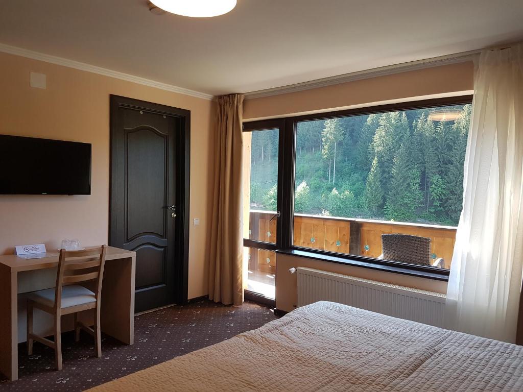 Fotografie z fotogalerie ubytování Carpatica Lodge v destinaci Moieciu de Sus