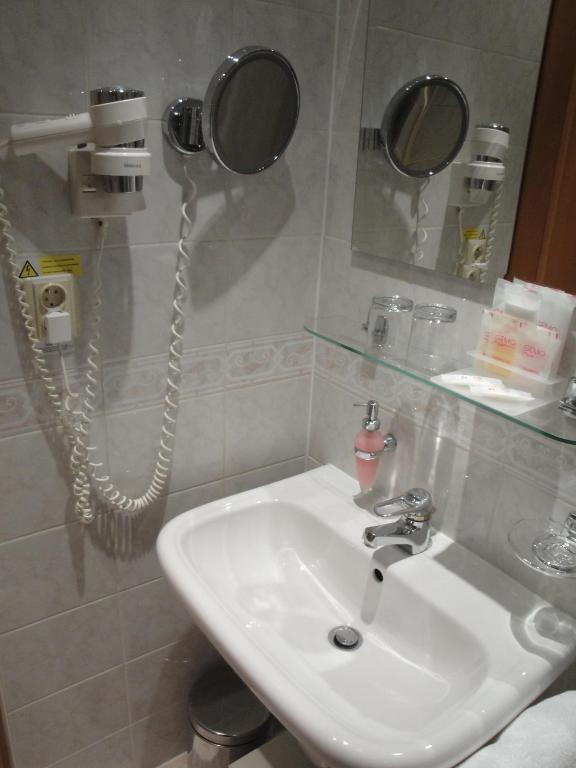 Koupelna v ubytování Hotel Trinity
