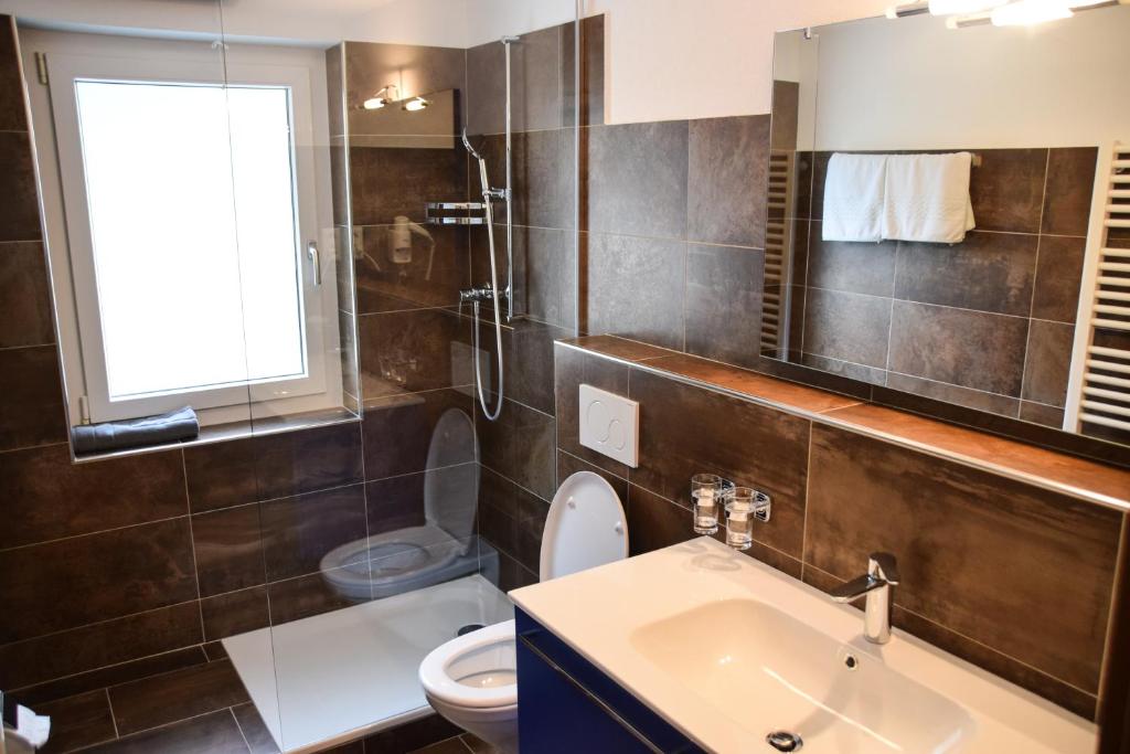 Koupelna v ubytování Hotel Posta