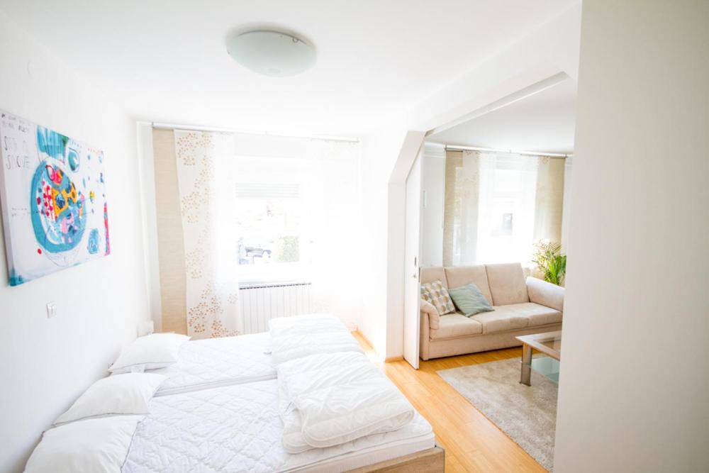 Postel nebo postele na pokoji v ubytování Apartma