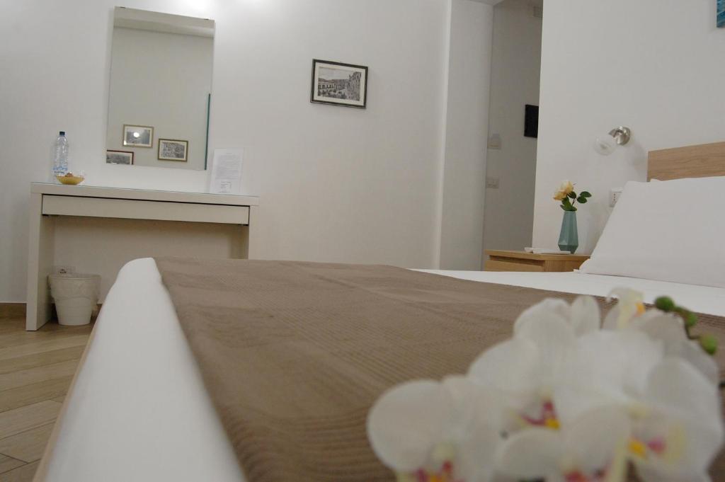 Postel nebo postele na pokoji v ubytování B&B Mormina