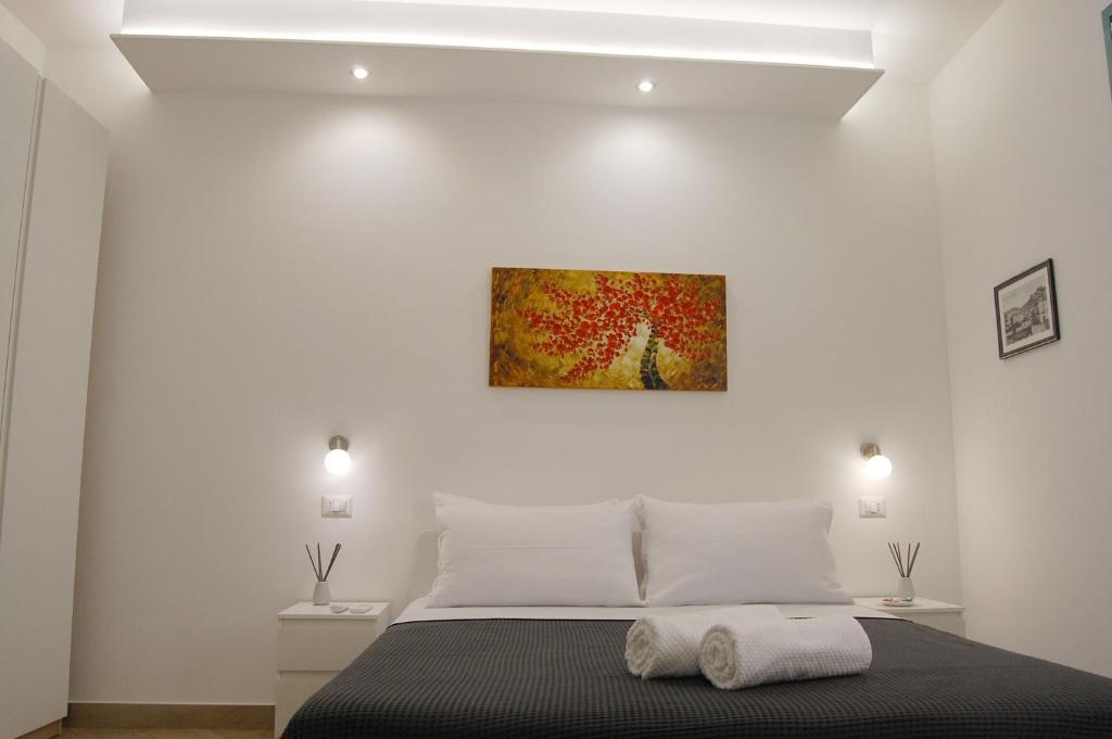 Postel nebo postele na pokoji v ubytování B&B Mormina