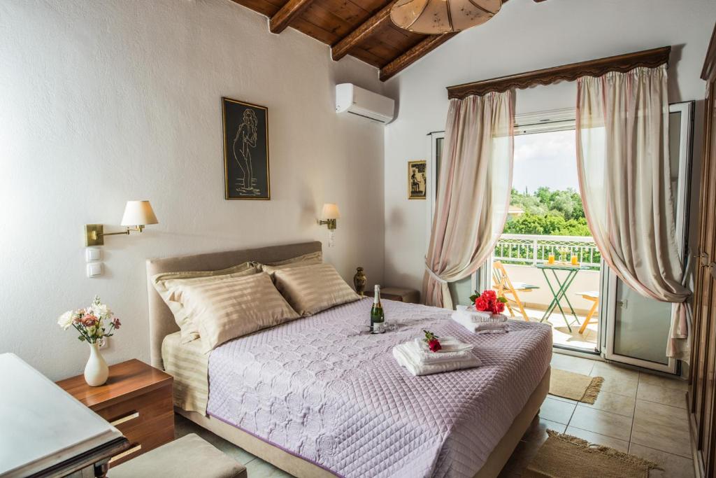 Postel nebo postele na pokoji v ubytování Villa Miranda