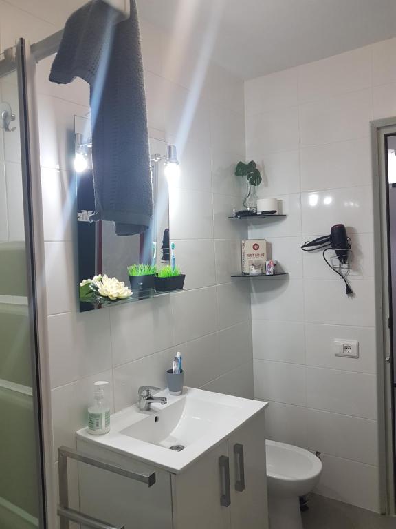 Koupelna v ubytování Centric Rooms Mercado