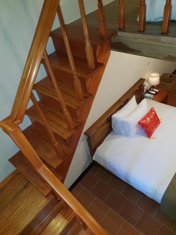 Postel nebo postele na pokoji v ubytování Mount Taiwu Cozy B&B