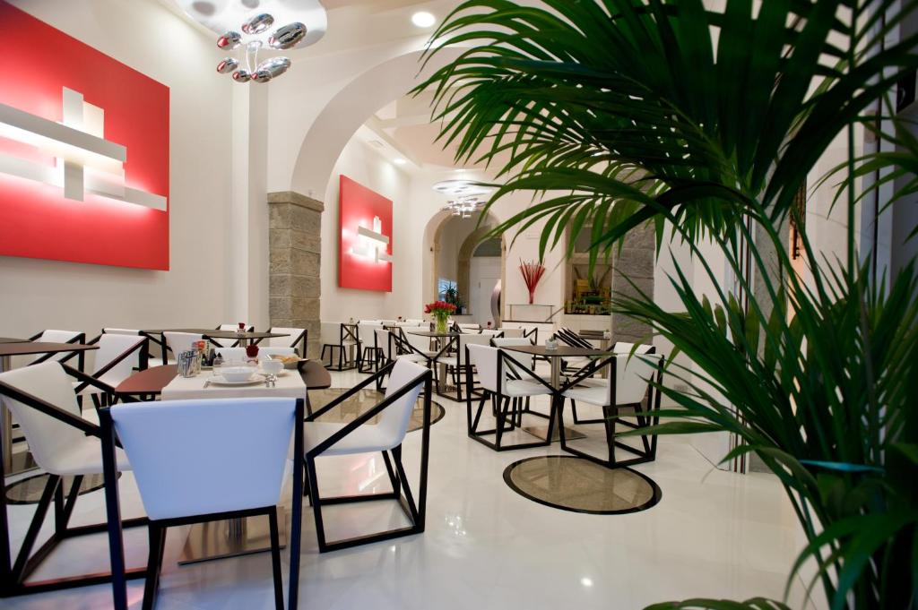 Reštaurácia alebo iné gastronomické zariadenie v ubytovaní Hotel Coppe Trieste - Boutique Hotel