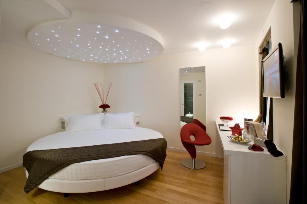 Posteľ alebo postele v izbe v ubytovaní Hotel Coppe Trieste - Boutique Hotel