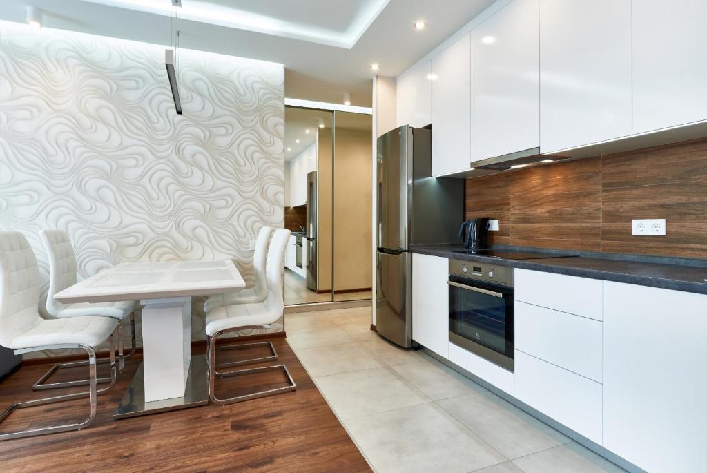 Kuchyň nebo kuchyňský kout v ubytování Apartment near Lukyanovka Square