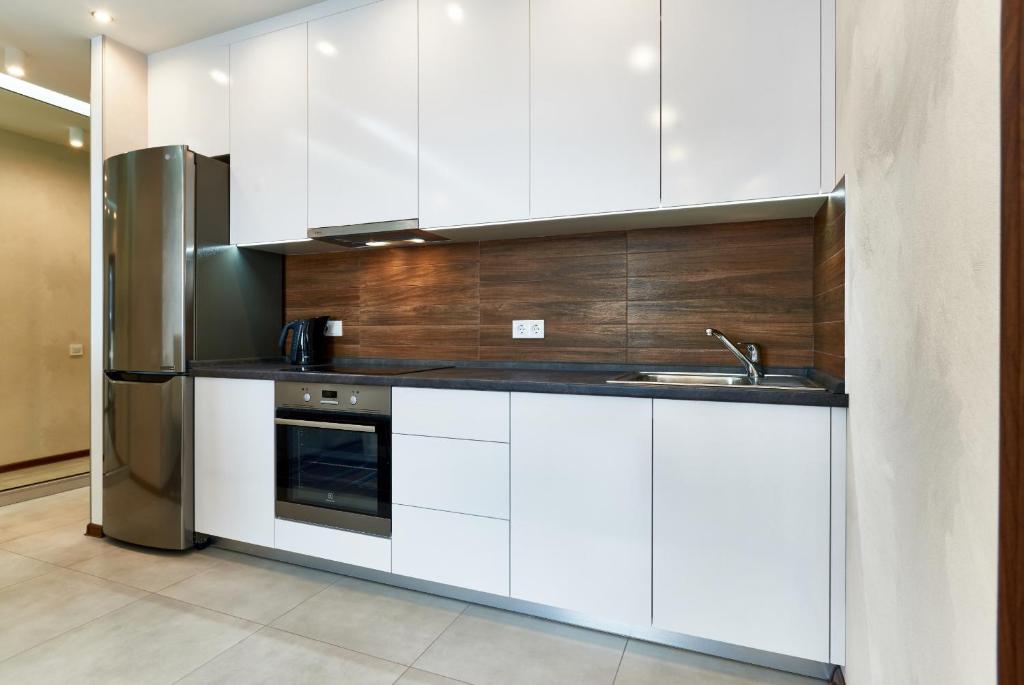 Kuchyň nebo kuchyňský kout v ubytování Apartment near Lukyanovka Square