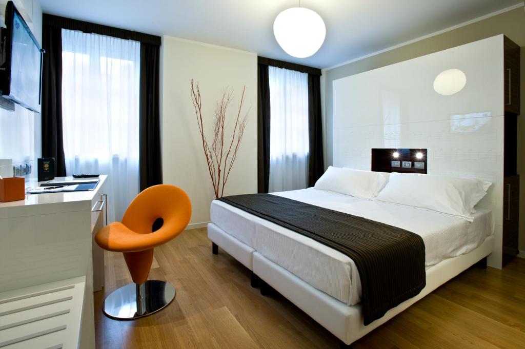 Posteľ alebo postele v izbe v ubytovaní Hotel Coppe Trieste - Boutique Hotel