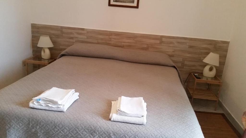 Postel nebo postele na pokoji v ubytování Barbara B&B