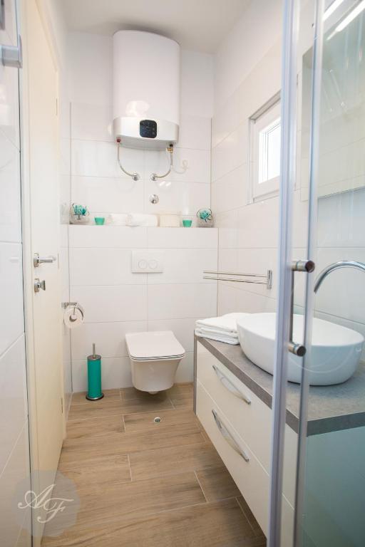 Kúpeľňa v ubytovaní Apartmani Ferdinanda