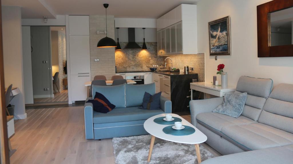 Kuchyňa alebo kuchynka v ubytovaní ASKI New Powiśle Copernicus Apartment