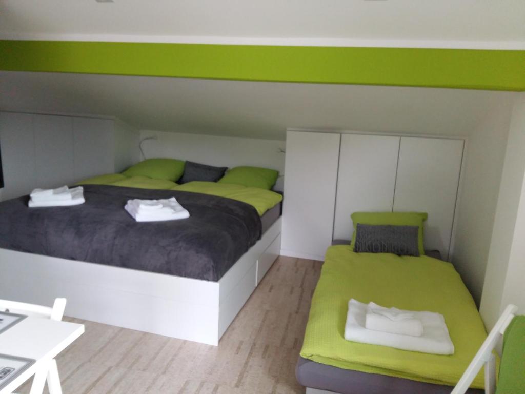 Postel nebo postele na pokoji v ubytování Le Manoir de Champlan