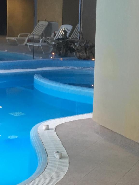 Bazén v ubytování Hotel L'Approdo nebo v jeho okolí