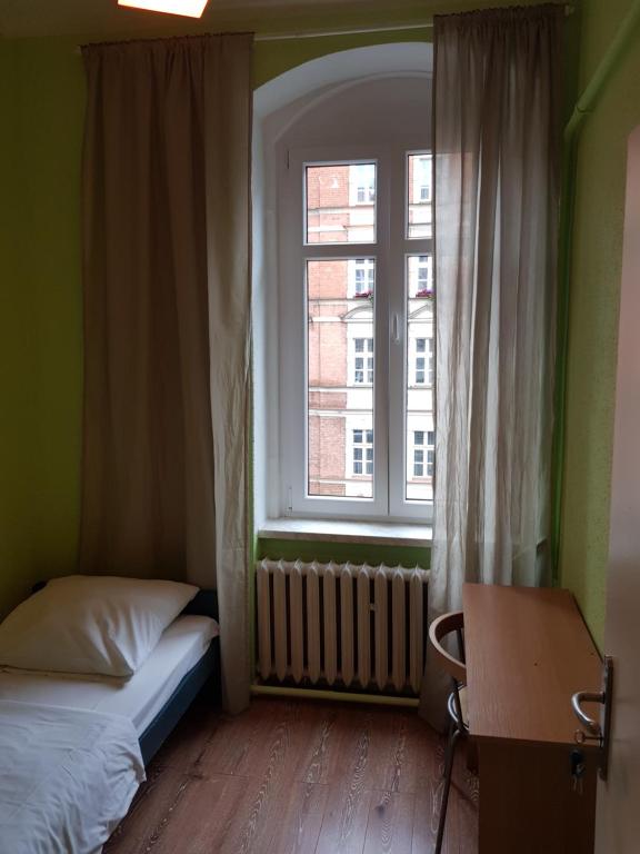 Postel nebo postele na pokoji v ubytování Kaktus Guest House