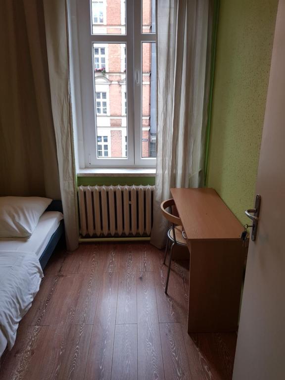 Postel nebo postele na pokoji v ubytování Kaktus Guest House