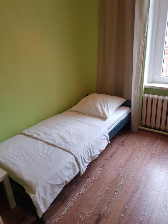 Postel nebo postele na pokoji v ubytování Kaktus Guest House