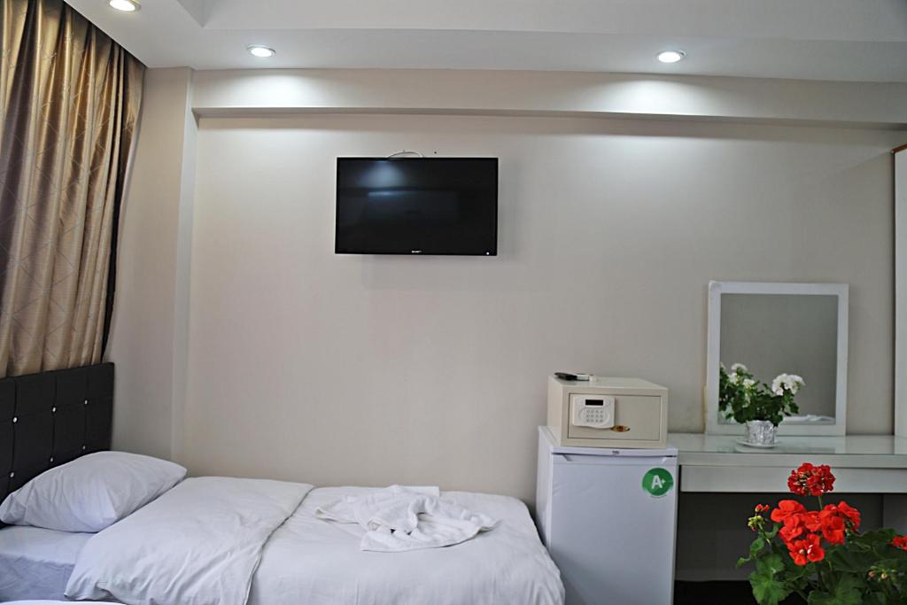 Postel nebo postele na pokoji v ubytování holiday family apart