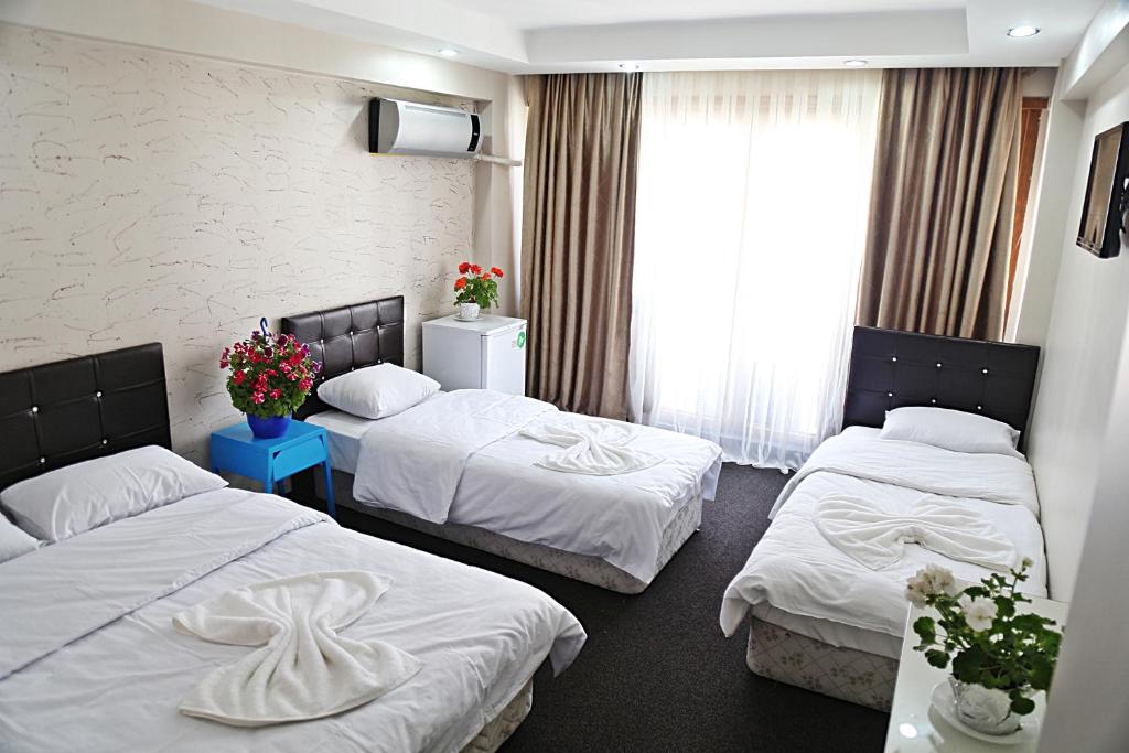Postel nebo postele na pokoji v ubytování holiday family apart