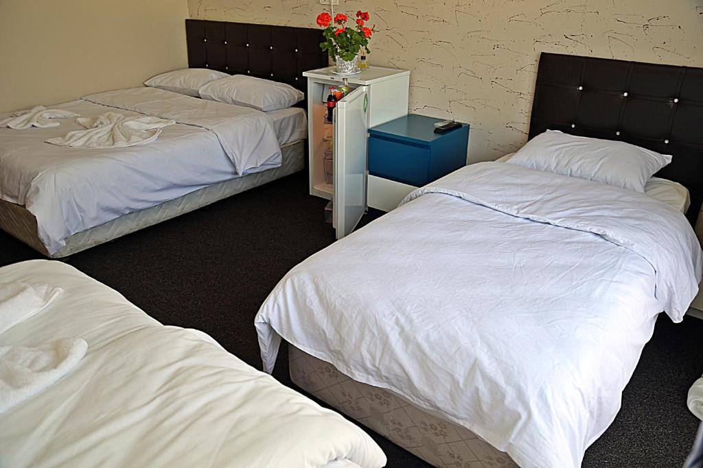 Postel nebo postele na pokoji v ubytování holiday family apart