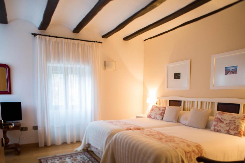 Postel nebo postele na pokoji v ubytování Casa de la Cadena
