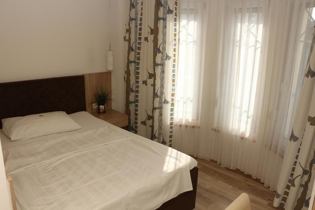 Postel nebo postele na pokoji v ubytování Pension Wachau
