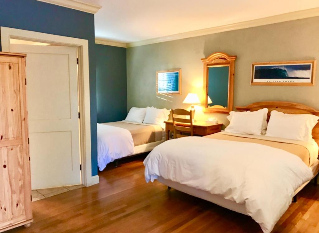 Postel nebo postele na pokoji v ubytování Southampton Long Island Hotel