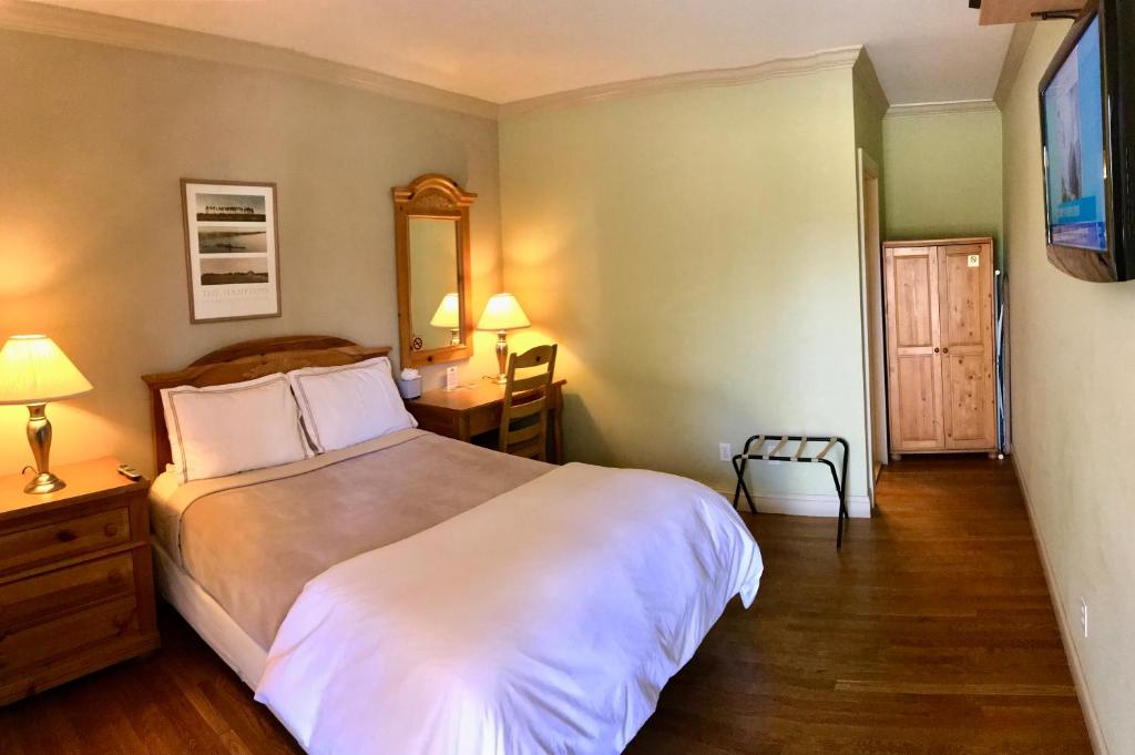 Postel nebo postele na pokoji v ubytování Southampton Long Island Hotel