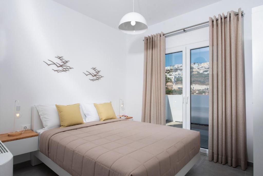 Postel nebo postele na pokoji v ubytování Valery Suites